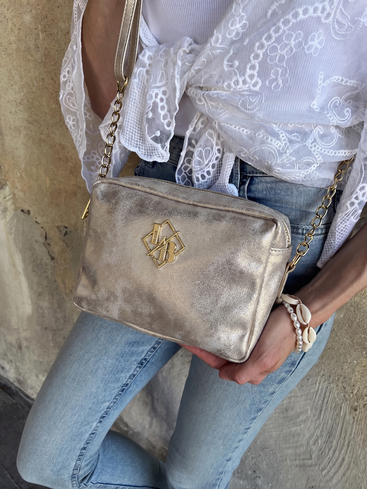 Zlatá crossbody Laura Biaggi s dvoma zipsmi