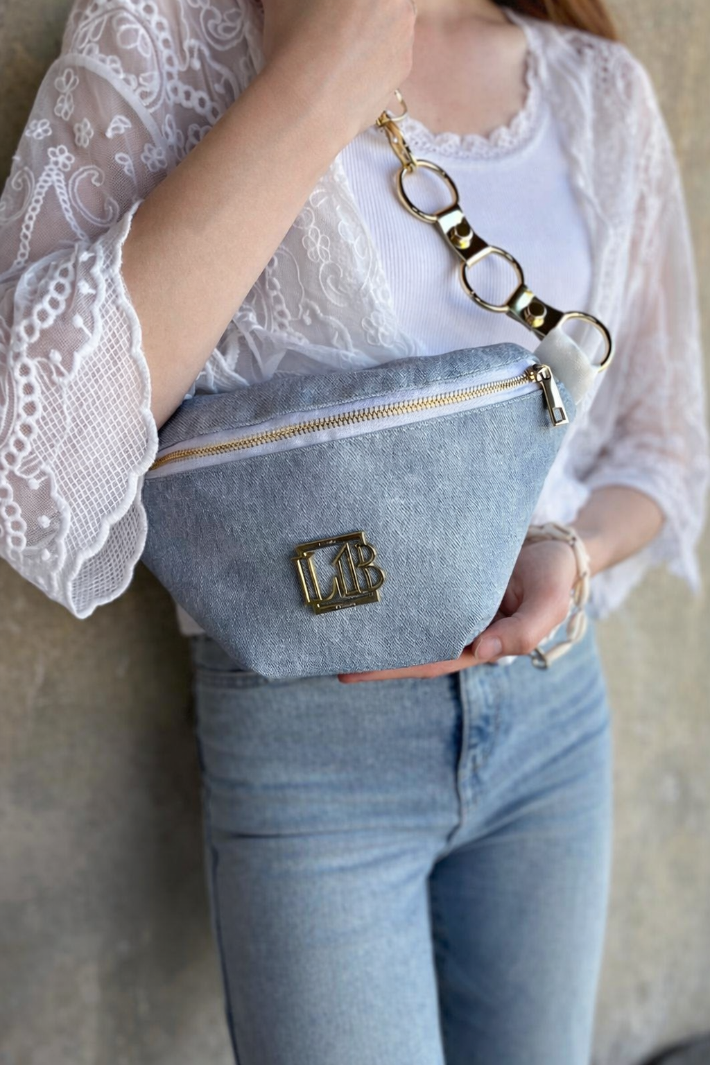 Svetlomodrá crossbody kapsička Laura Biaggi DX-KB82-light jeans