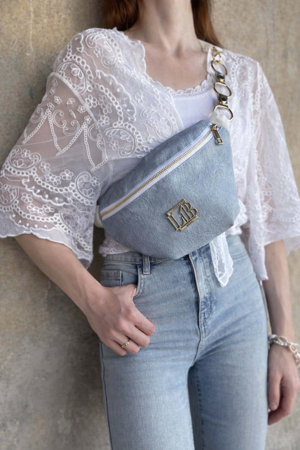 Svetlomodrá crossbody kapsička Laura Biaggi DX-KB82-light jeans